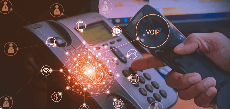 A hand holding a phone receiver over a VoIP desk phone with digital overlays.