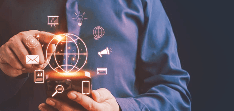 A person holding a mobile phone with digital sphere icons floating around it.